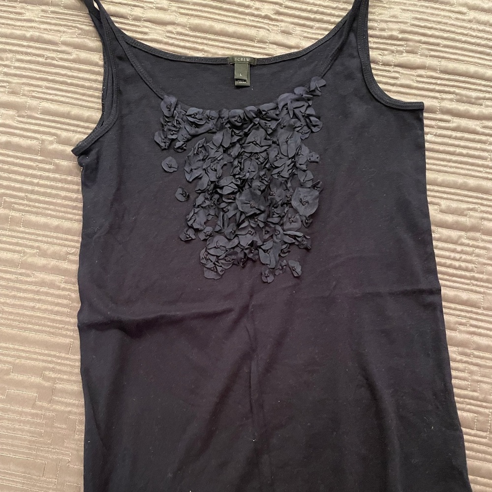 Navy tank top with navy floral touch on front